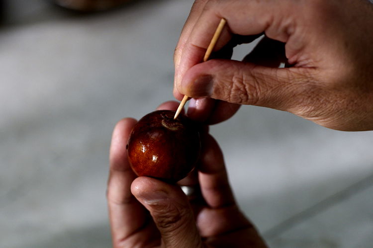 Image of First, remove the pit from a medium sized avocado (~45cm...
